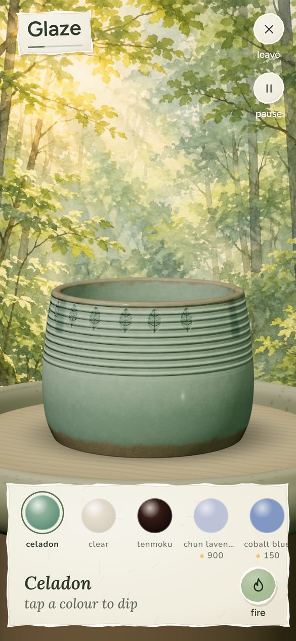 A pot dipped in celadon glaze in a forest scene