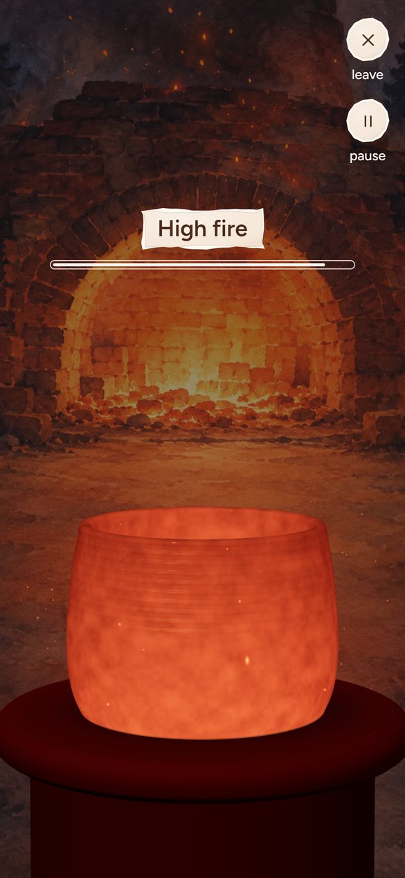 A pot glowing red hot in the kiln